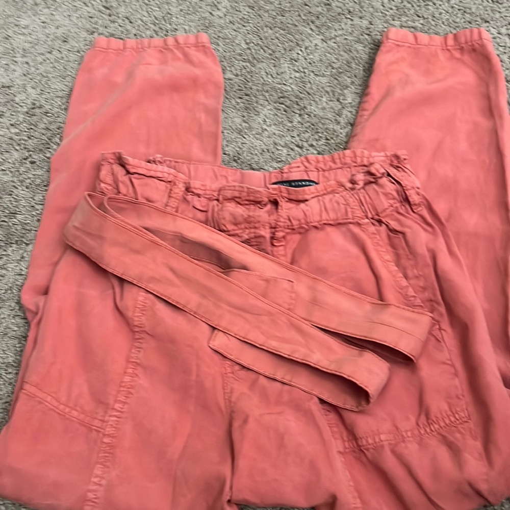 Red women’s slacks size XS, never worn